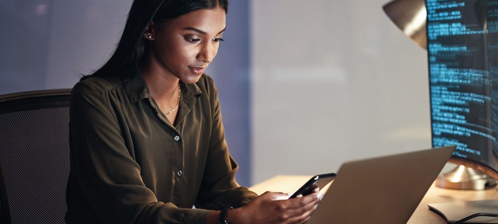 Laptop,,Phone,And,Business,Woman,On,Coding,,Software,Development,And